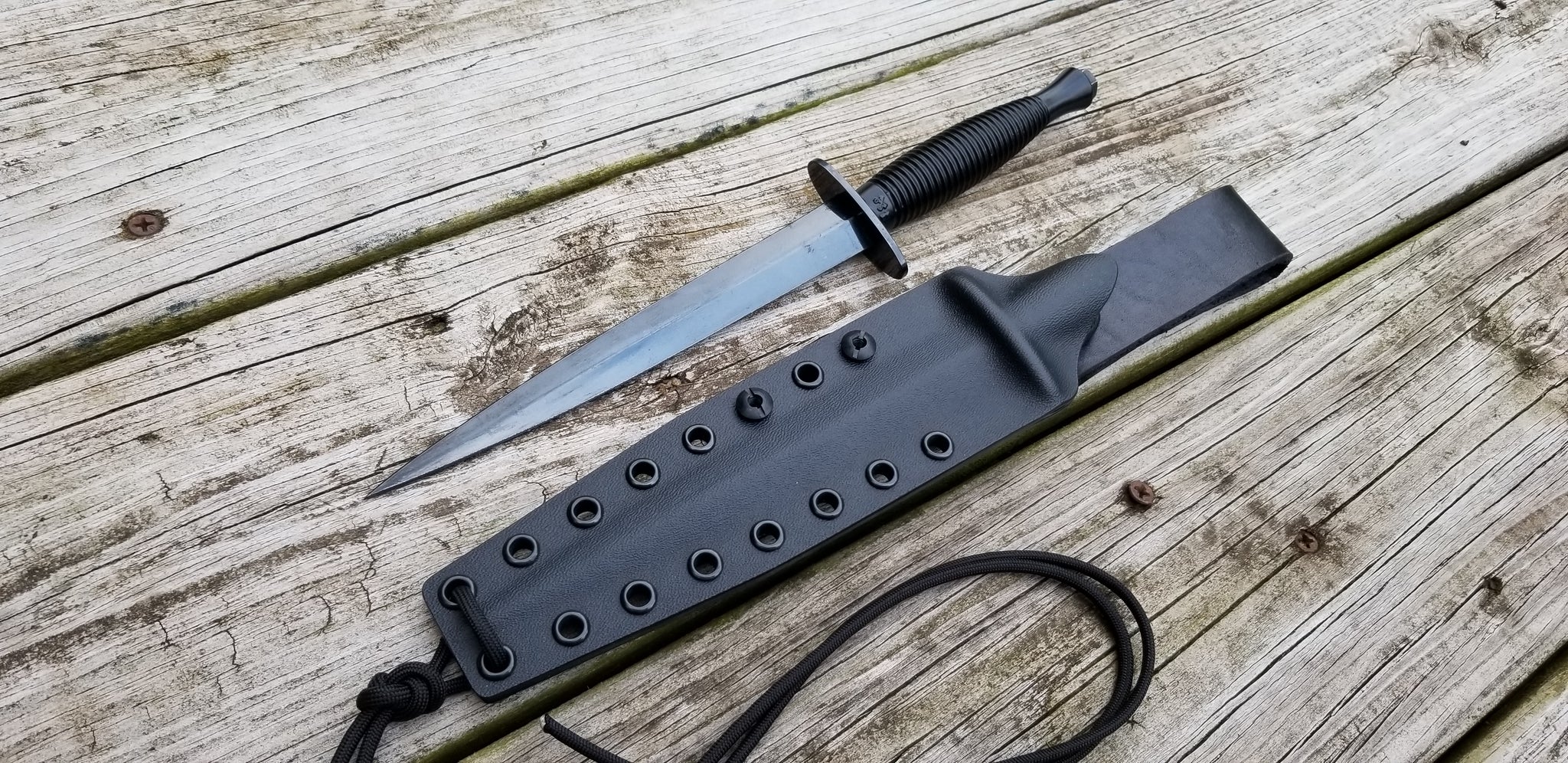 Fairbairn sykes commando custom Pancake style kydex sheath w/ Leather Looped offset drop belt attach.